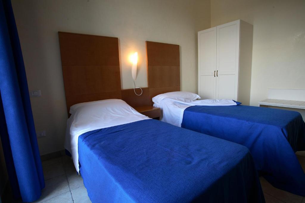 Hotel Resort Portoselvaggio Sant Isidoro  Rom bilde